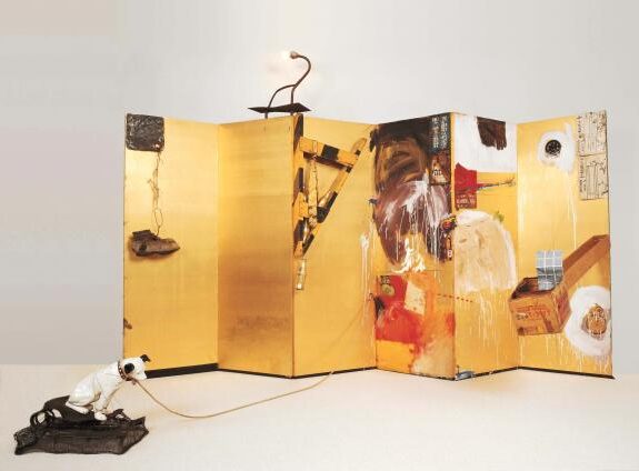 Gold Standard, 1964, by Robert Rauschenberg reflects the critique of material value and cultural icons through eclectic imagery and layered mixed-media abstraction.